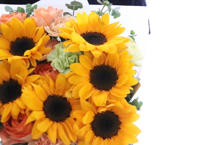 ひまわり入りの花束 9,000円