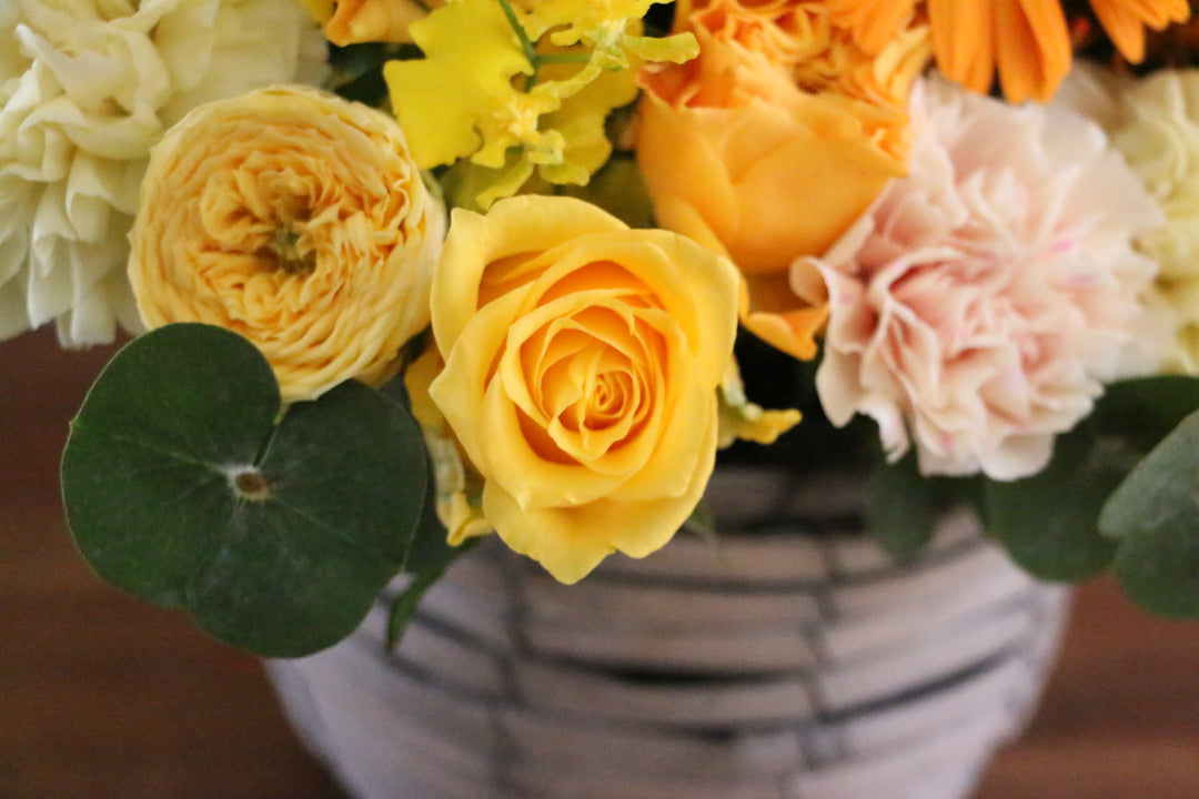 黄色・オレンジ色のアレンジメント 12,000円