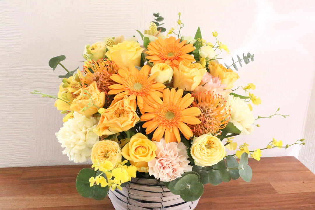 黄色・オレンジ色のアレンジメント 10,000円