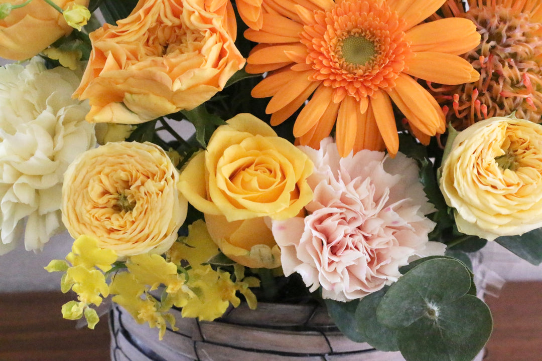 黄色・オレンジ色のアレンジメント 9,000円