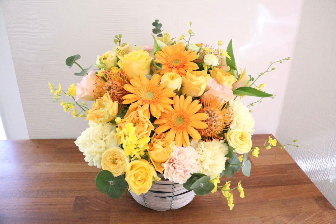 黄色・オレンジ色のアレンジメント 12,000円