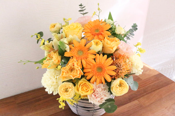 黄色・オレンジ色のアレンジメント 9,000円