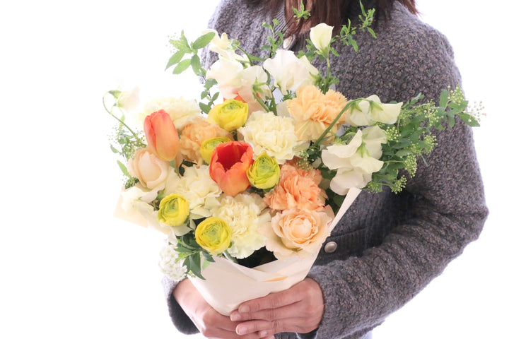 春のお花で束ねる花束 10,000円（黄色・オレンジ系）