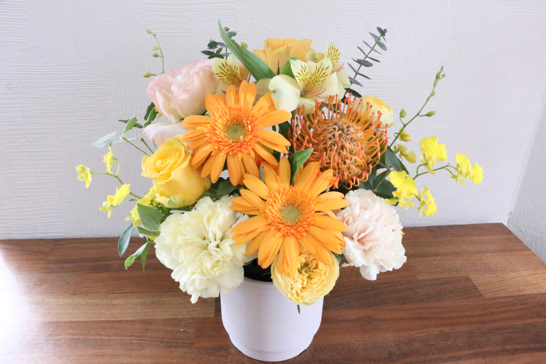 黄色・オレンジ色のアレンジメント 7,000円