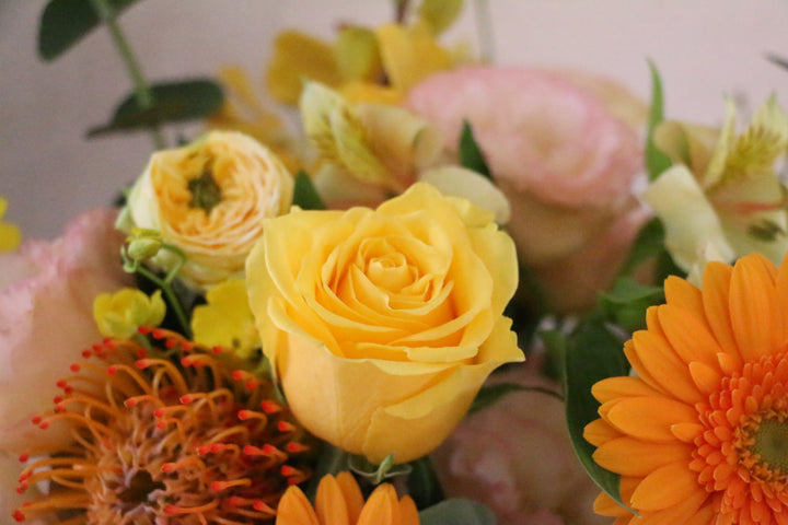 黄色・オレンジ色のアレンジメント 15,000円