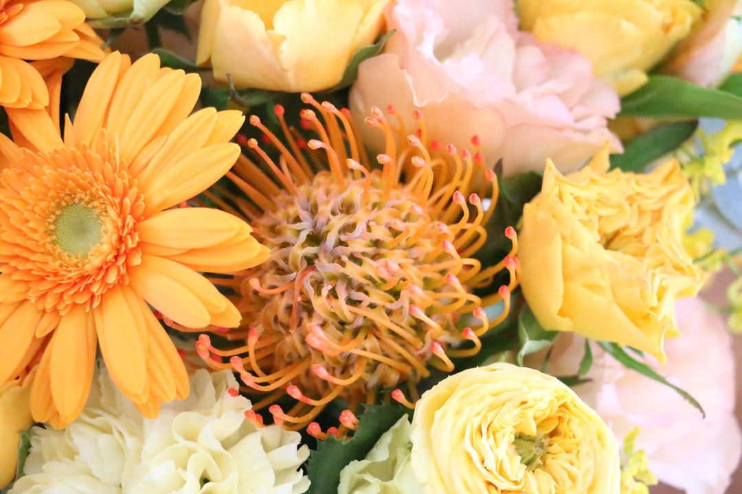 黄色・オレンジ色のアレンジメント 15,000円