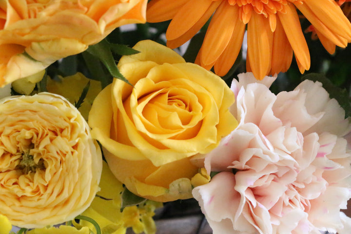 黄色・オレンジ色のアレンジメント 8,000円