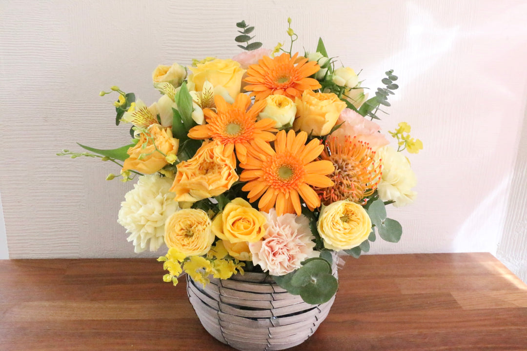 黄色・オレンジ色のアレンジメント 9,000円