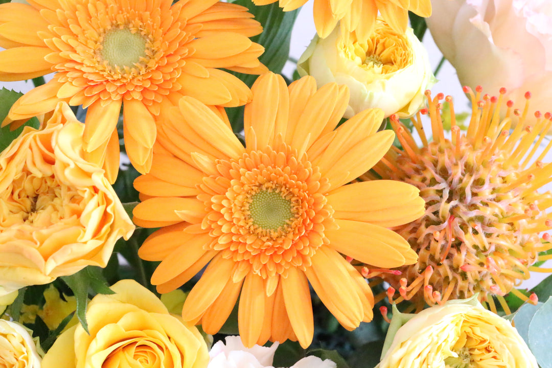 黄色・オレンジ色のアレンジメント 8,000円