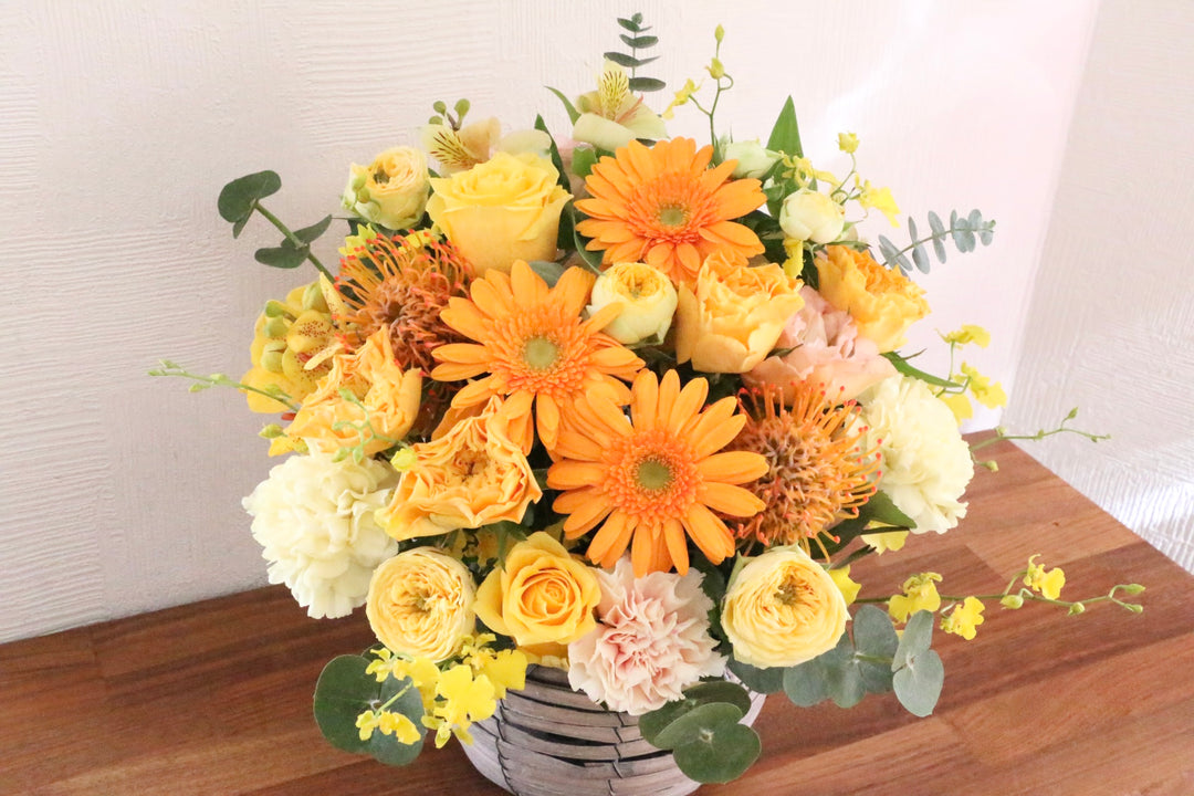 黄色・オレンジ色のアレンジメント 10,000円