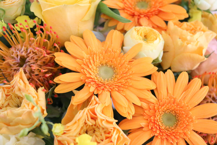 黄色・オレンジ色のアレンジメント 12,000円