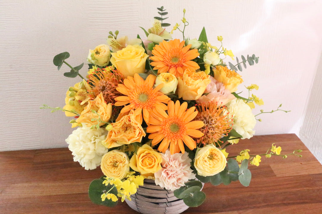 黄色・オレンジ色のアレンジメント 10,000円