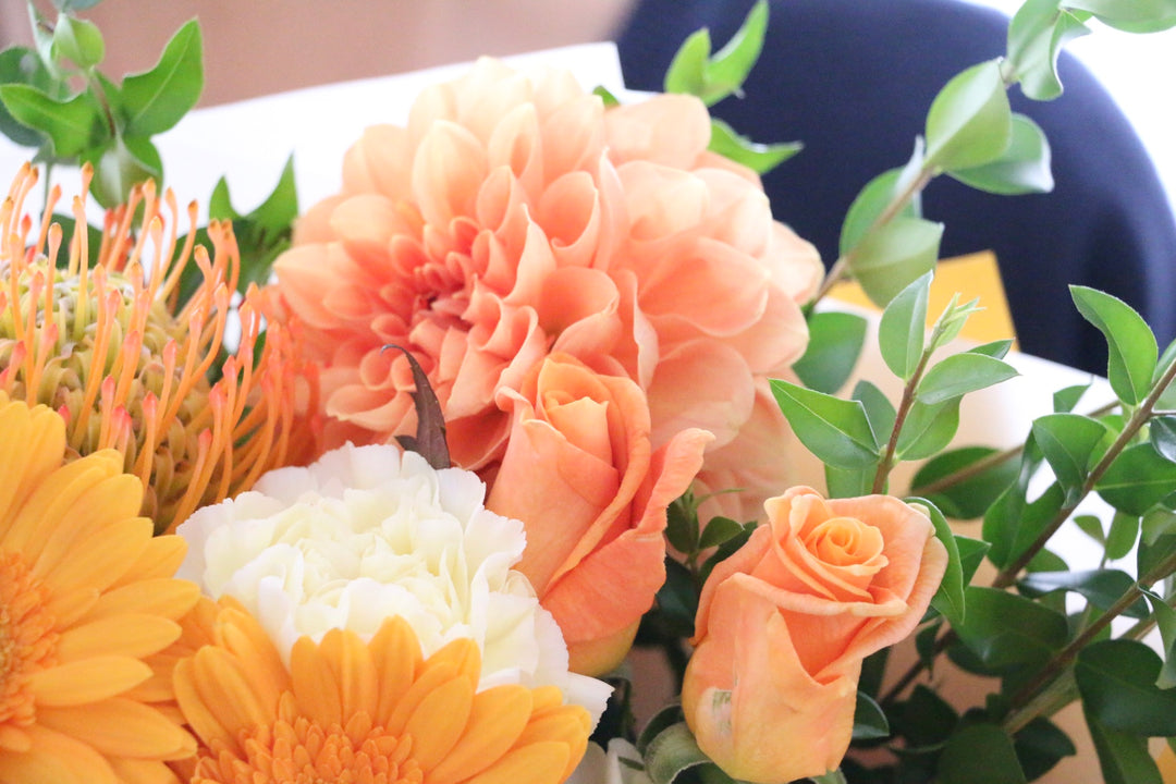 黄色・オレンジ色の花束 9,000円