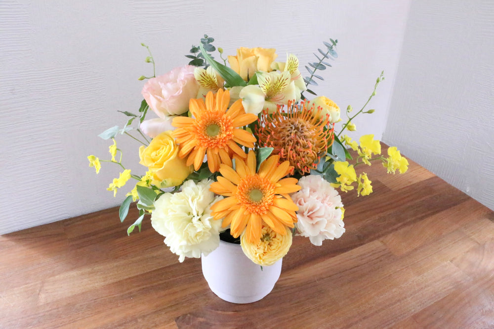 黄色・オレンジ色のアレンジメント 7,000円