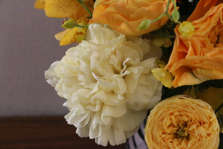 黄色・オレンジ色のアレンジメント 10,000円