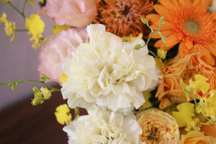 黄色・オレンジ色のアレンジメント 15,000円