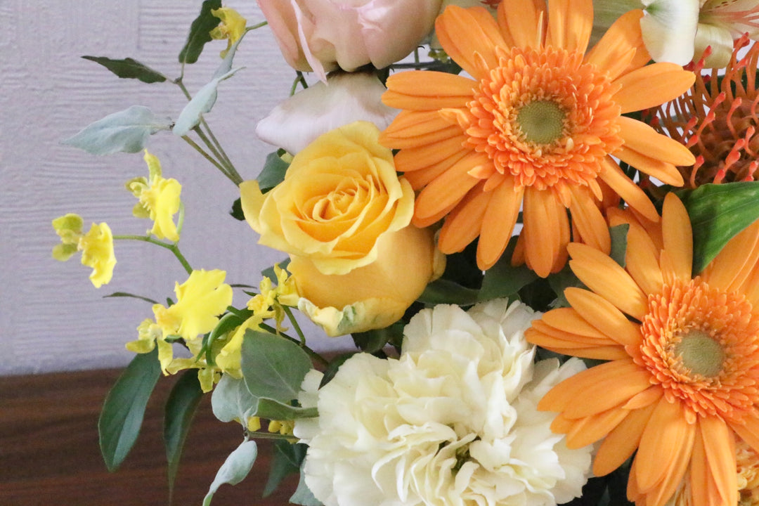 黄色・オレンジ色のアレンジメント 7,000円
