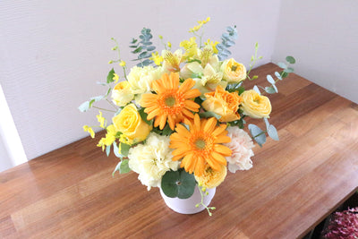 黄色・オレンジ色のアレンジメント 6,000円