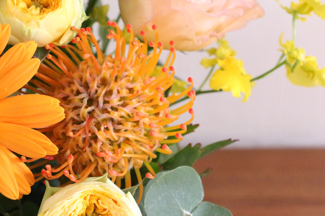 黄色・オレンジ色のアレンジメント 8,000円