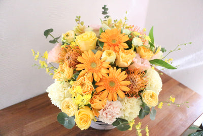 黄色・オレンジ色のアレンジメント 12,000円