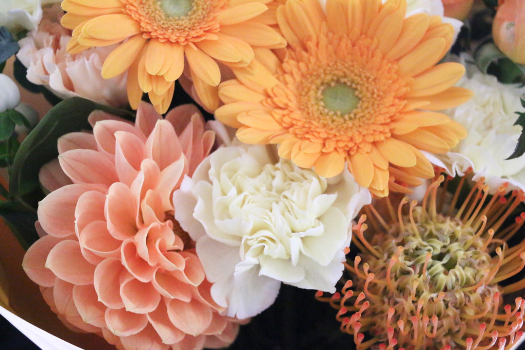 黄色・オレンジ色の花束 9,000円