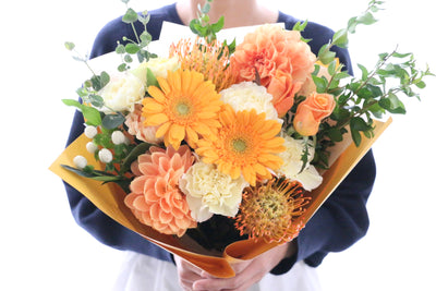黄色・オレンジ色の花束 9,000円
