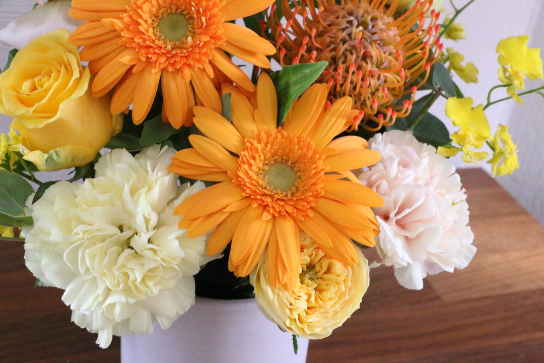 黄色・オレンジ色のアレンジメント 7,000円