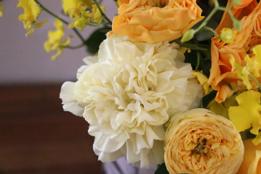 黄色・オレンジ色のアレンジメント 12,000円