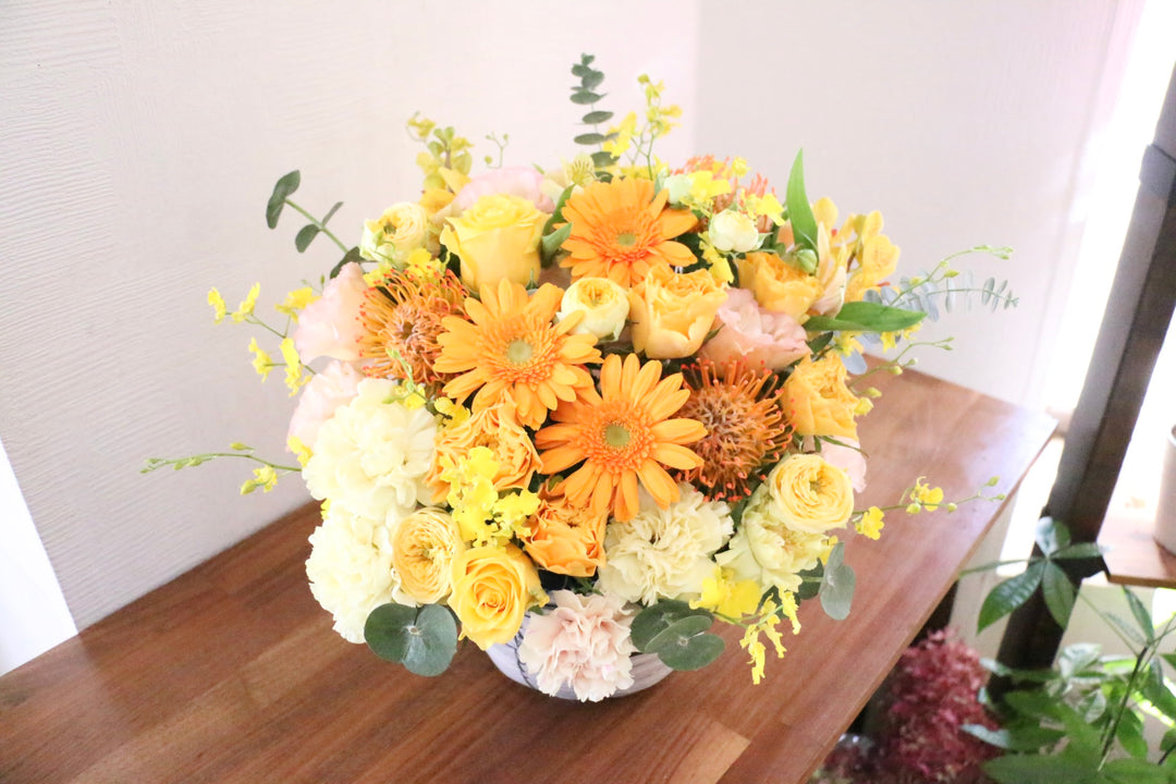 黄色・オレンジ色のアレンジメント 15,000円