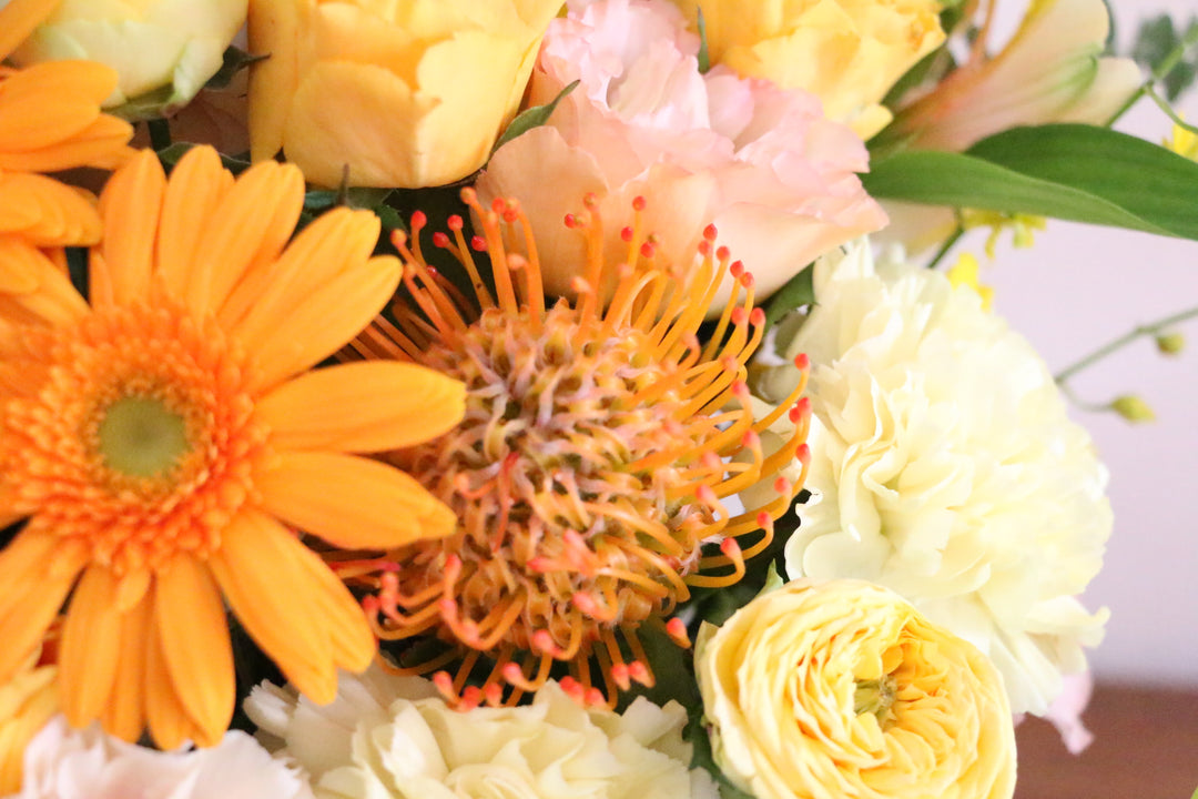 黄色・オレンジ色のアレンジメント 12,000円