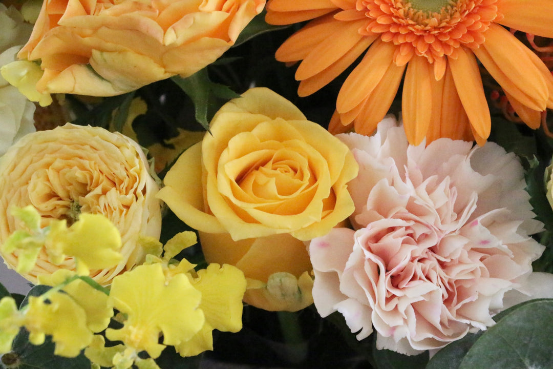 黄色・オレンジ色のアレンジメント 10,000円