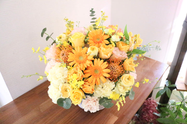 黄色・オレンジ色のアレンジメント 15,000円