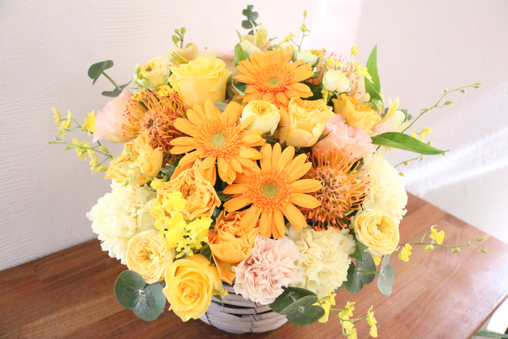 黄色・オレンジ色のアレンジメント 12,000円
