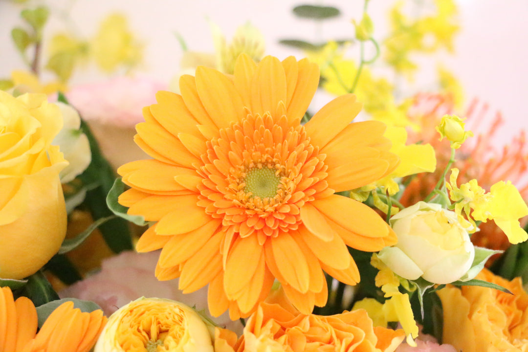 黄色・オレンジ色のアレンジメント 15,000円